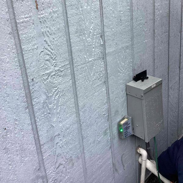 Lifetime Heating, Cooling, Plumbing & Electric outdoor home surge protector.