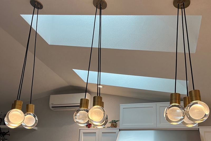 Electrical System Maintenance Can Save Your Health and Home. Lights hanging in a kithcen.