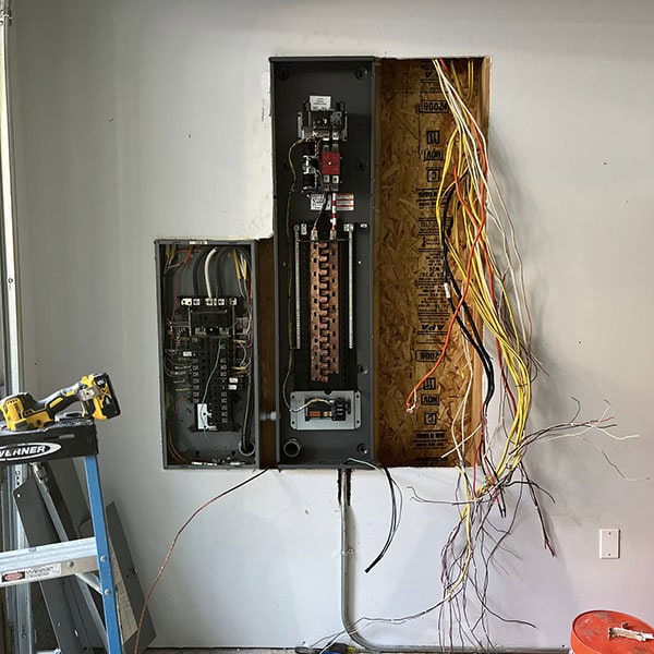 Lifetime Heating, Cooling, Plumbing & Electric installation of a residential circuit breaker.