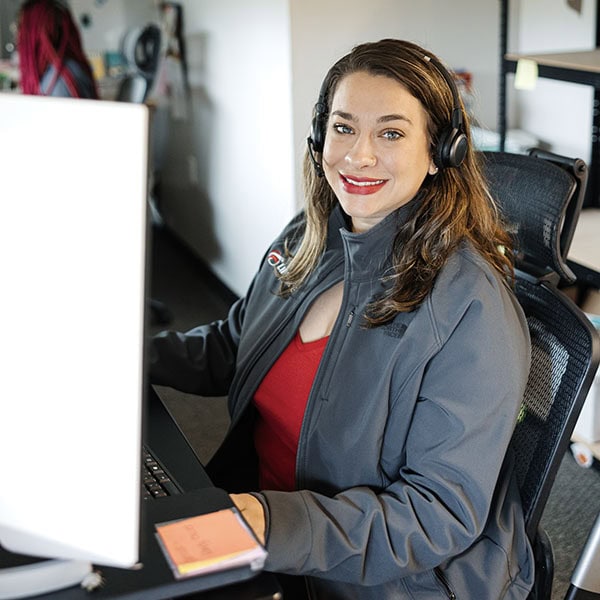 drinking-water-2_600x600 Lifetime Heating, Cooling, Plumbing & Electric customer service representative smiling at computer desk.