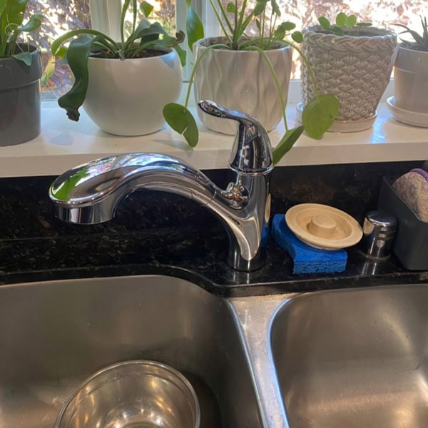 Residential kitchen faucet and sink.