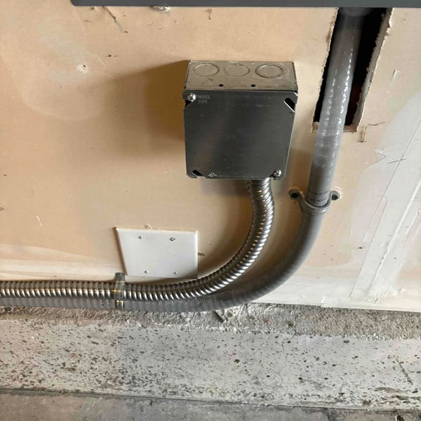 Lifetime Heating, Cooling, Plumbing & Electric indoor electrical box.