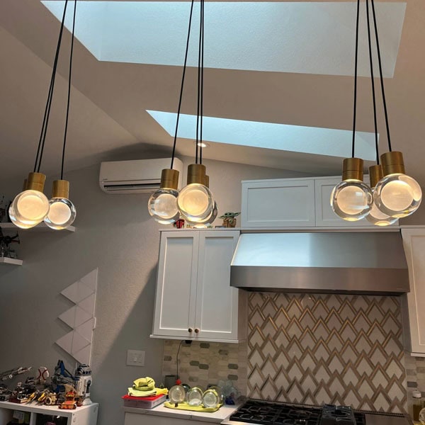 indoor-and-outdoor-lighting-2_600x600 Lifetime Heating, Cooling, Plumbing & Electric indoor lighting installation over kitchen island.