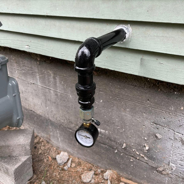 Outside pipe with meter.