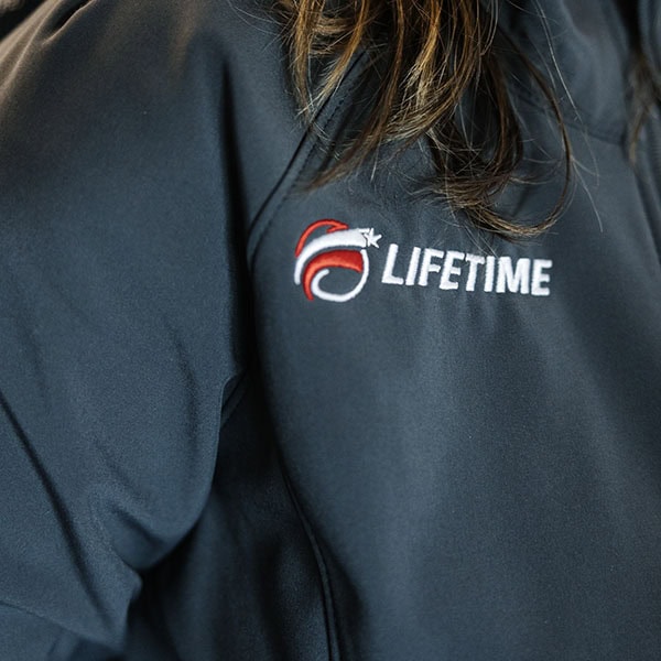 Lifetime Heating, Cooling, Plumbing & Electric logo on jacket.